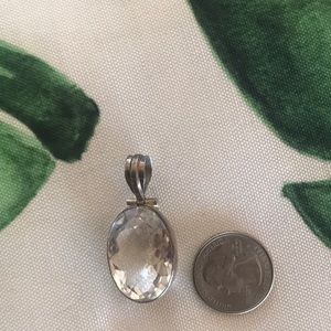 Quartz crystal and silver pendant